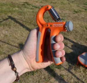 Еспандер кистьовий Power System PS-4021 з регульованим навантаженням 10 - 40 кг Power Hand Grip помаранчевий