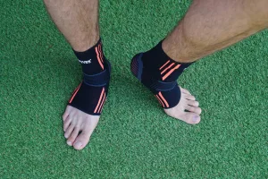 Бандажі на гомілкостоп Power System PS-6022 Ankle Support Evo Black/Orange 2 шт. - M