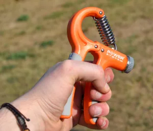 Еспандер кистьовий Power System PS-4021 з регульованим навантаженням 10 - 40 кг Power Hand Grip помаранчевий