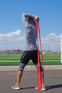 Стрічка-еспандер для фітнесу та реабілітації PowerPlay 4112 0,6 мм MediBand Heavy червона (11 кг)