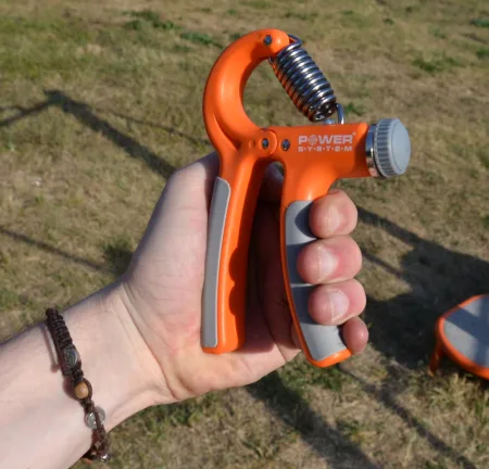 Еспандер кистьовий Power System PS-4021 з регульованим навантаженням 10 - 40 кг Power Hand Grip помаранчевий