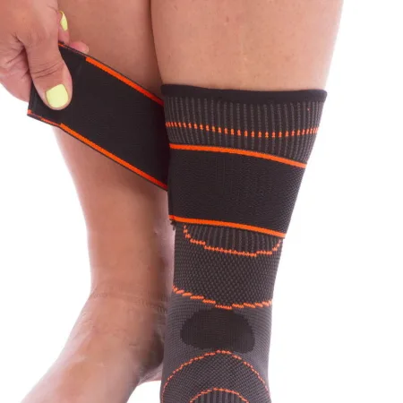 Бандаж на гомілковостоп еластичний з фіксуючим ременем (фіксатор кісточки) EXTREME чорний-помаранчевий - L