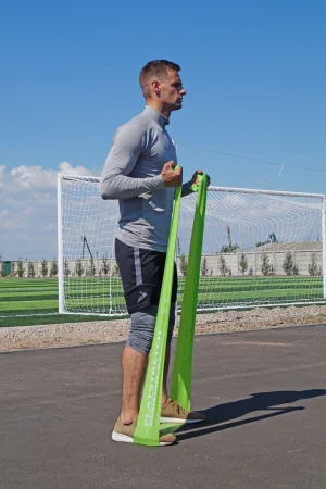 Стрічка-еспандер для фітнесу та реабілітації PowerPlay 4112 0,5 мм MediBand Medium зелена (9 кг)