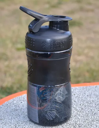 Шейкер спортивний пляшка BlenderBottle SportMixer Flip 590 мл чорний