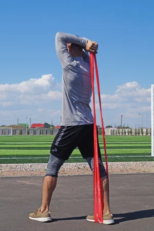 Стрічка-еспандер для фітнесу та реабілітації PowerPlay 4112 0,6 мм MediBand Heavy червона (11 кг)